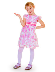 The happy girl in a pink dress