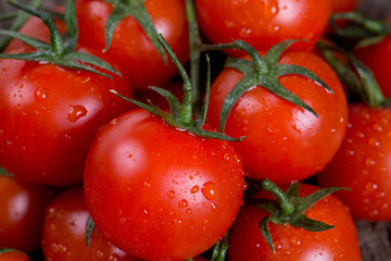 cherry tomatoes on rustic wooden surface