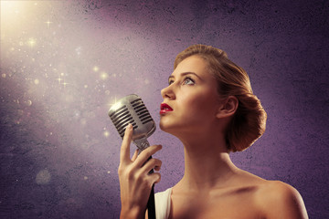 attractive female singer with microphone