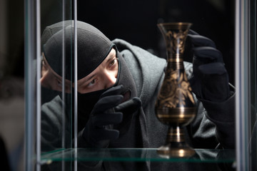 burglar wearing black mask