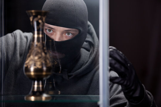 burglar wearing black mask