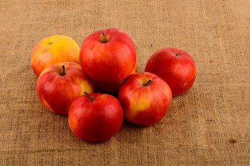 Still life with apples on burlap background