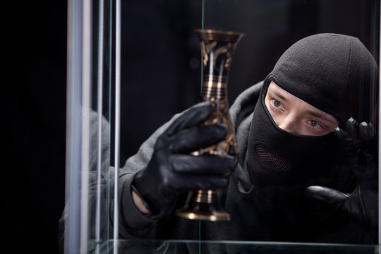 burglar wearing black mask