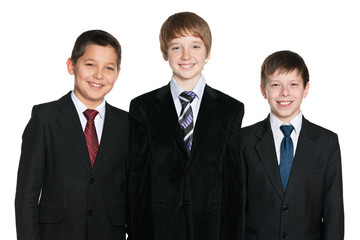 Laughing young boys in black suits