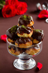 profiteroles with cream and chocolate.