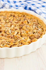 Delicious fresh baked  apple pie on a wooden surface