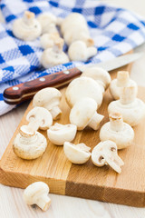 Fresh mushrooms on a wooden surface