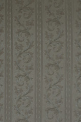 pattern of old, bright wallpaper on the wall