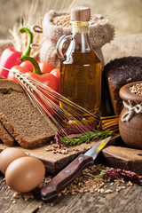 Bread rye spikelets on an old background