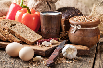 Bread rye spikelets on an old background