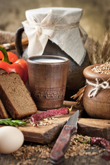 Bread rye spikelets on an old background