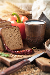 Bread rye spikelets on an old background