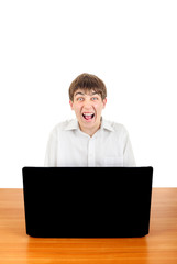 Frightened Teenager behind Laptop