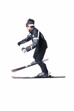 One male skier skiing without sticks on a white background