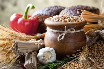 Bread rye spikelets on an old background