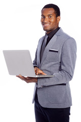 Business man with a laptop, isolated over a white background