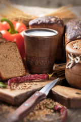 Bread rye spikelets on an old background