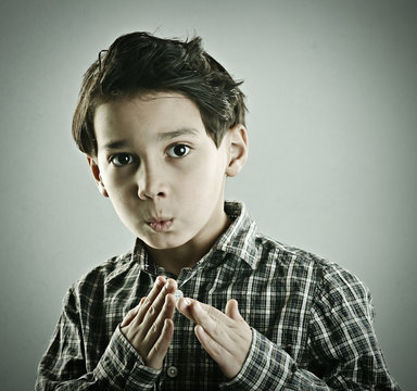 Little cute boy posing for retro style photography