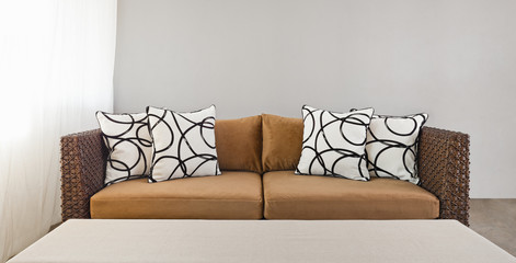 Beige sofa with pillows