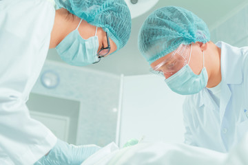 Surgeons works in operating room