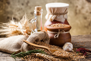 Bread rye spikelets on an old background