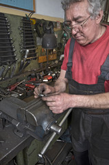 Adjusting in machine workshop