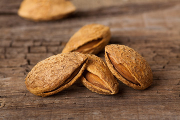 Almonds on wooden board