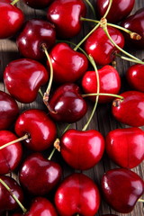 Ripe of cherry on a wooden table