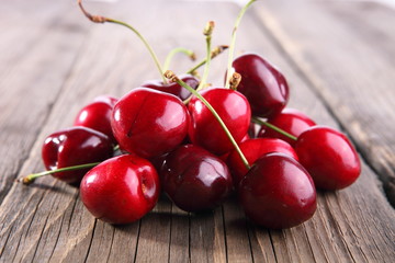 Ripe of cherry on a wooden table