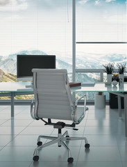 Modern desk and armchair against huge window