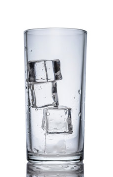 Wet Empty Transparent Glass With Ice Cubes