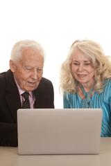 elderly couple business computer look down