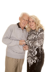 elderly couple heads together smile