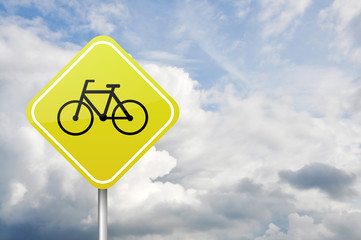 Yellow road warning sign with bicycle