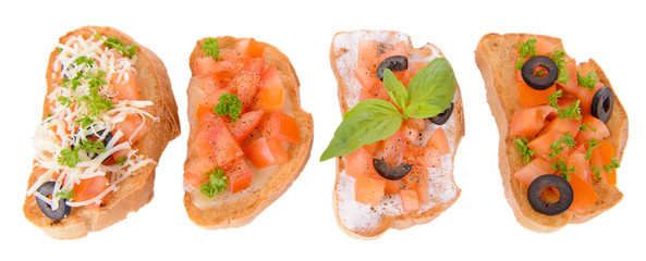 Delicious bruschetta with tomatoes isolated on white