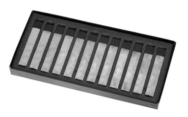 Black drawing charcoals isolated on white