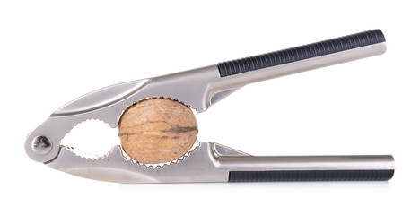 Nutcracker with walnut isolated on white