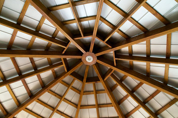 looking up at  eight sided exposed beam roof