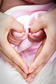 lovely baby with Mam use hand