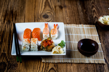 Japanese composition with sushi on the wooden table