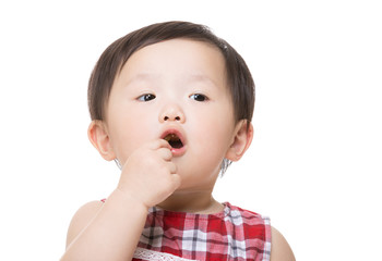 Asian baby girl eating snack