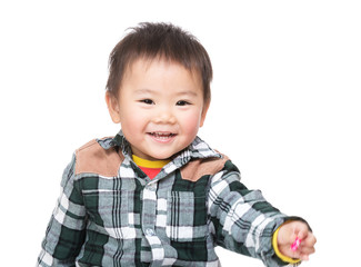 Asian baby boy give hand to you