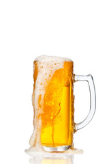 Glass of beer on white background