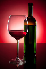 Red wine on red background