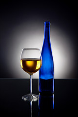 White wine on black background