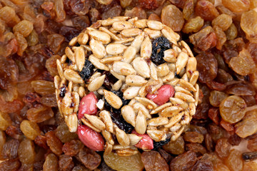 Round candied seeds and nuts with raisins.