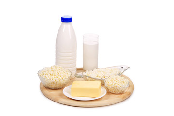 Composition of milk product on wood platter.