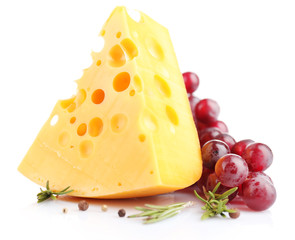 Piece of cheese with grape and rosemary, isolated on white
