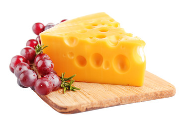 Piece of cheese and grape on wooden board, isolated on white