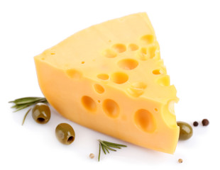 Piece of cheese with green olives, isolated on white